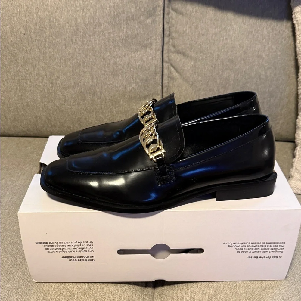 Aldo Black Leather Loafers with Gold Chain Trim